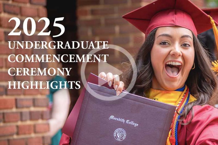 Image of Graduate Proudly Holding diploma.