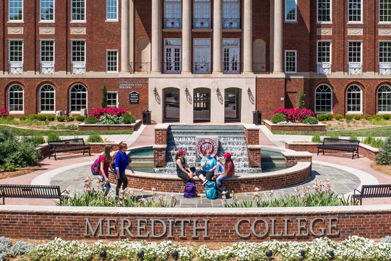 Students in front of Johnson Hall during class change.